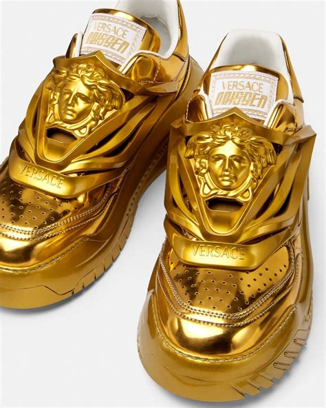 gold Versace sneakers